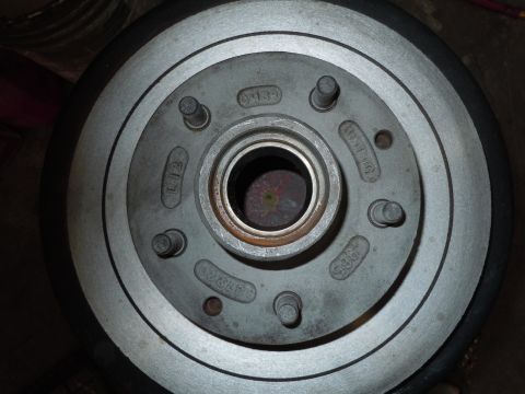 1973 Pontiac Trans Am - Close-up of a car brake rotor showing stamped part numbers.
