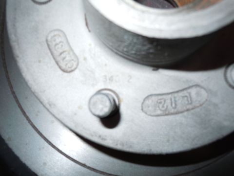 1973 Pontiac Trans Am - This is a close-up view of a vehicle's brake rotor with various stamped numbers and markings visible.