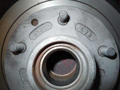 1973 Pontiac Trans Am - Close-up of a vehicle brake rotor showing stamped manufacturing codes.