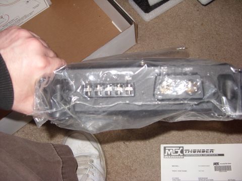 2006 Ford E350 - An MSX Thunder audio amplifier is shown, with its connection terminals visible.