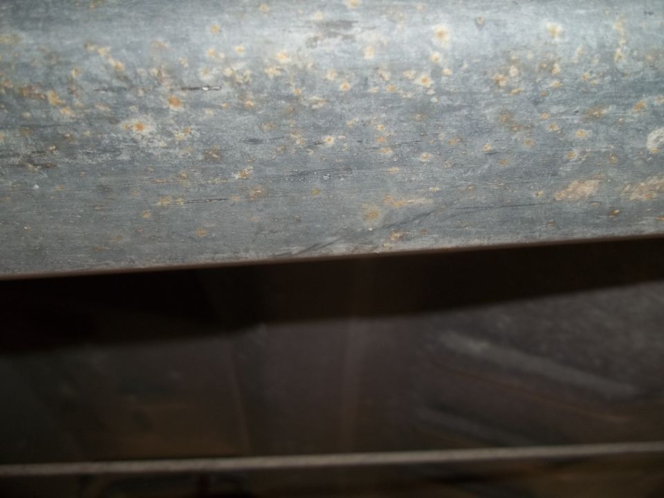 close-up of rusted metal frame with some pitting