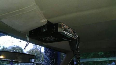 1989 Ford Bronco - A CB radio is installed above the visor in this vehicle's interior.