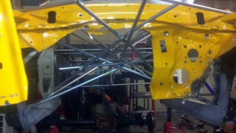 1978 Ford Mustang II - Modified car chassis with roll cage, likely for racing or performance build.