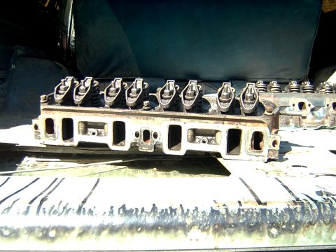 1982 Ford Bronco - Close-up of an engine cylinder head, likely from a V8 engine.