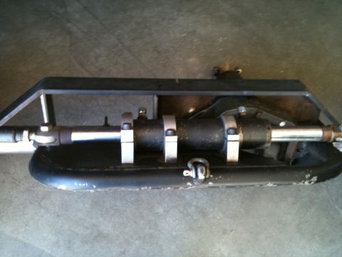 1966 Ford Bronco - This image shows a steering column assembly, likely a replacement part, with a black housing and a silver shaft.