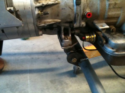1966 Ford Bronco - Close-up view of vehicle transmission and exhaust system components, with a SuperMotors watermark.