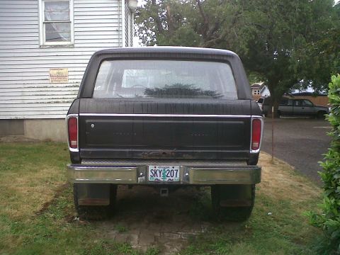 1979 Ford Bronco - Rear view of a black 1979 Ford Bronco, showing its distinctive body style and Oregon license plate.