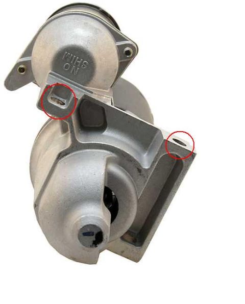 1996 Ford Bronco - Close-up view of a starter motor, with key mounting locations circled in red.