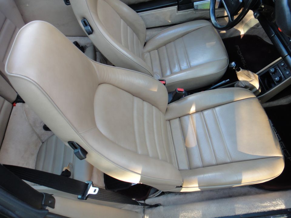tan leather car seats and dashboard