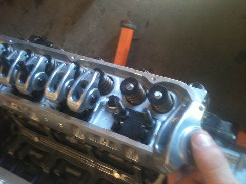 1993 Ford Bronco - Engine valve train components, including rocker arms and valve springs, are visible in this close-up shot.