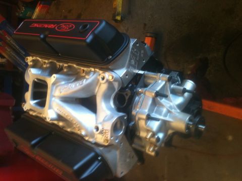 1993 Ford Bronco - Close-up of a Ford V8 engine, likely a performance build, with aftermarket parts visible.