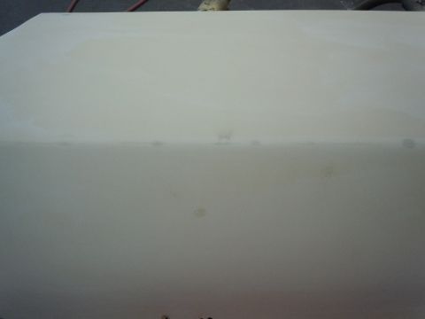 1973 Pontiac Trans Am - A section of a car's body, likely a fender or hood, is shown in a neutral primer color.