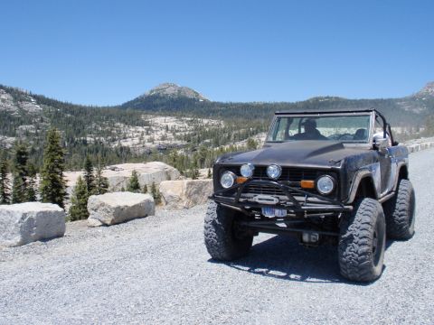 1971 Ford Bronco - A classic 1971 Ford Bronco sits ready for adventure on a scenic mountain road.