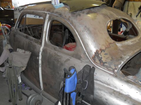 2006 Ford E350 - This vehicle appears to be in the process of restoration, with its bodywork stripped down and prepped for primer.