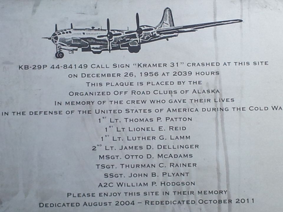 Plaque with illustration of a B-29 bomber and text detailing a crash