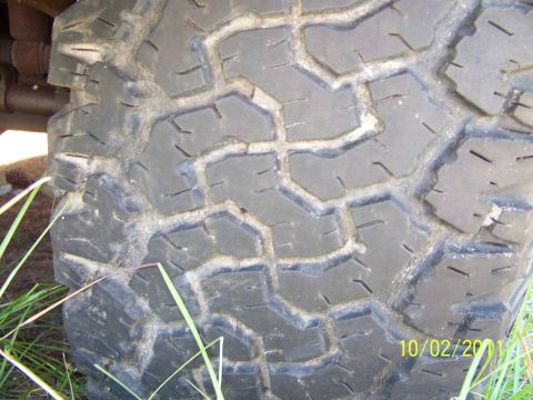 1986 Ford Bronco - 35x12.50x15 BFG All Terrains 40-50% tread. 2 showing alingment wear. On aluminum bullet holes, 5 on 5.5.
