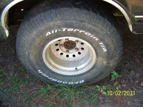 1986 Ford Bronco - 35x12.50x15 BFG All Terrains 40-50% tread. 2 showing alingment wear. On aluminum bullet holes, 5 on 5.5.