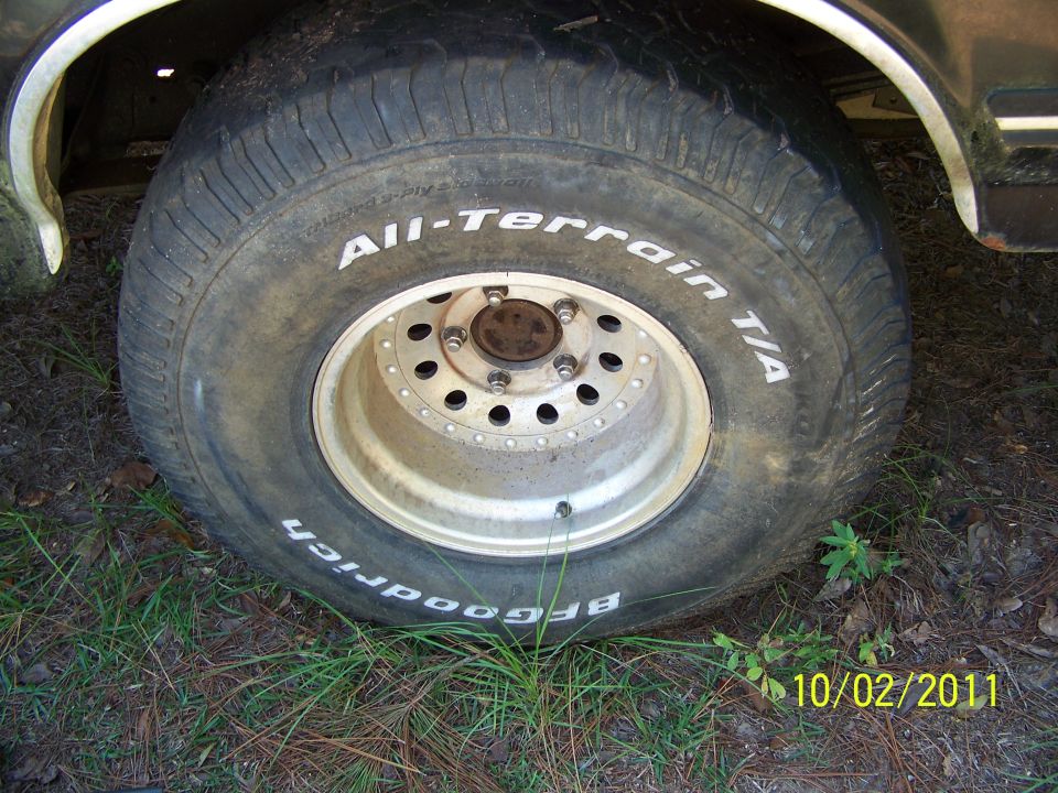 35x12.50x15 BFG All Terrains 40-50% tread.  2 showing alingment wear.  On aluminum bullet holes, 5 on 5.5.