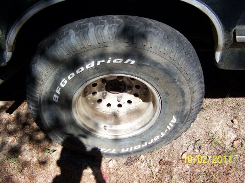 1986 Ford Bronco - 35x12.50x15 BFG All Terrains 40-50% tread. 2 showing alingment wear. On aluminum bullet holes, 5 on 5.5.
