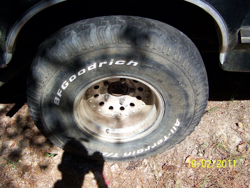 35x12.50x15 BFG All Terrains 40-50% tread.  2 showing alingment wear.  On aluminum bullet holes, 5 on 5.5.