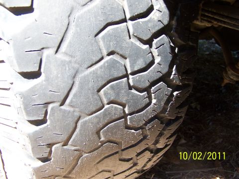 1986 Ford Bronco - 35x12.50x15 BFG All Terrains 40-50% tread. 2 showing alingment wear. On aluminum bullet holes, 5 on 5.5.