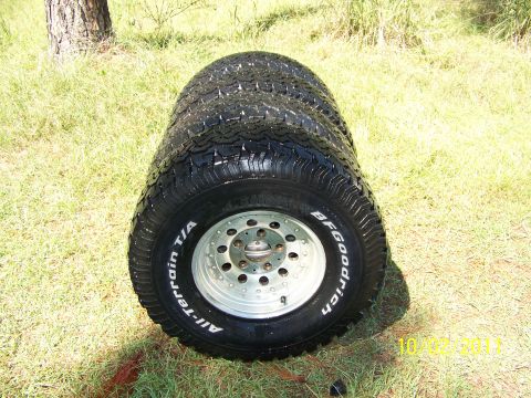 1986 Ford Bronco - set of 4, also have a 5th with 45-50% tread, all on aluminum bullet hole rims 5 on 5.5