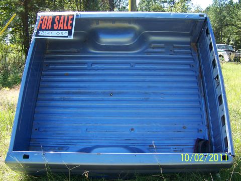 1986 Ford Bronco - 87-96 short bed, with tailgate. Near excellent condition.