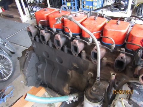 1984 Ford Bronco - Close-up of a diesel engine's intake and fuel system components, with a date stamp of 10/02/2011.