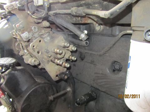 1984 Ford Bronco - Close-up view of an engine's fuel injection pump and associated components, with a visible date stamp of 10/02/2011.