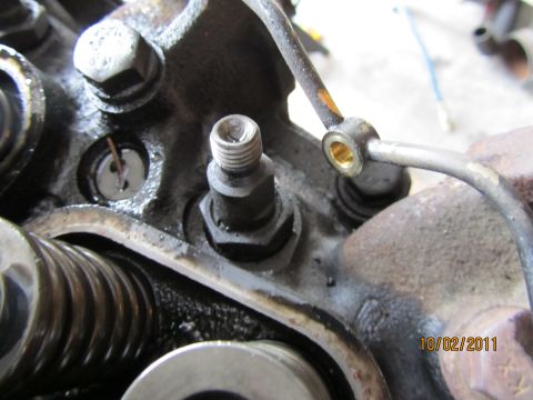 1984 Ford Bronco - Engine components are visible in this close-up view, showing mechanical parts and fluid lines.