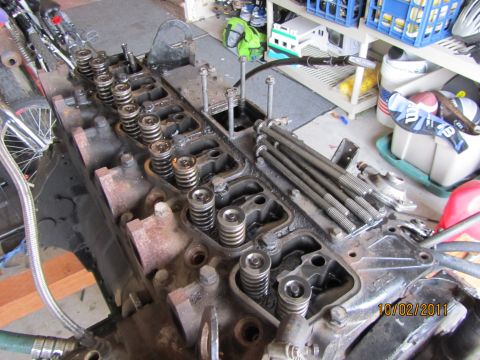 1984 Ford Bronco - Close-up view of an engine block, showing valves and springs, with a date stamp of 10/02/2011.