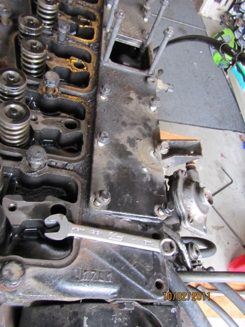1984 Ford Bronco - Engine block with valve train components visible and a wrench resting on the block.