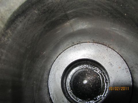 1984 Ford Bronco - Engine cylinder interior showing wear and oil. Part number 7N63 is visible.