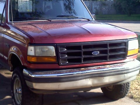 1992 Ford F-150 - Front view of a 1992 Ford F-150 pickup truck, showing the grille and headlights.