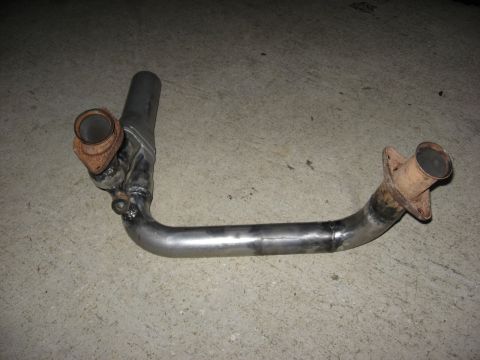 1994 Ford Bronco - Custom exhaust pipe assembly with welded joints and two flange connections.