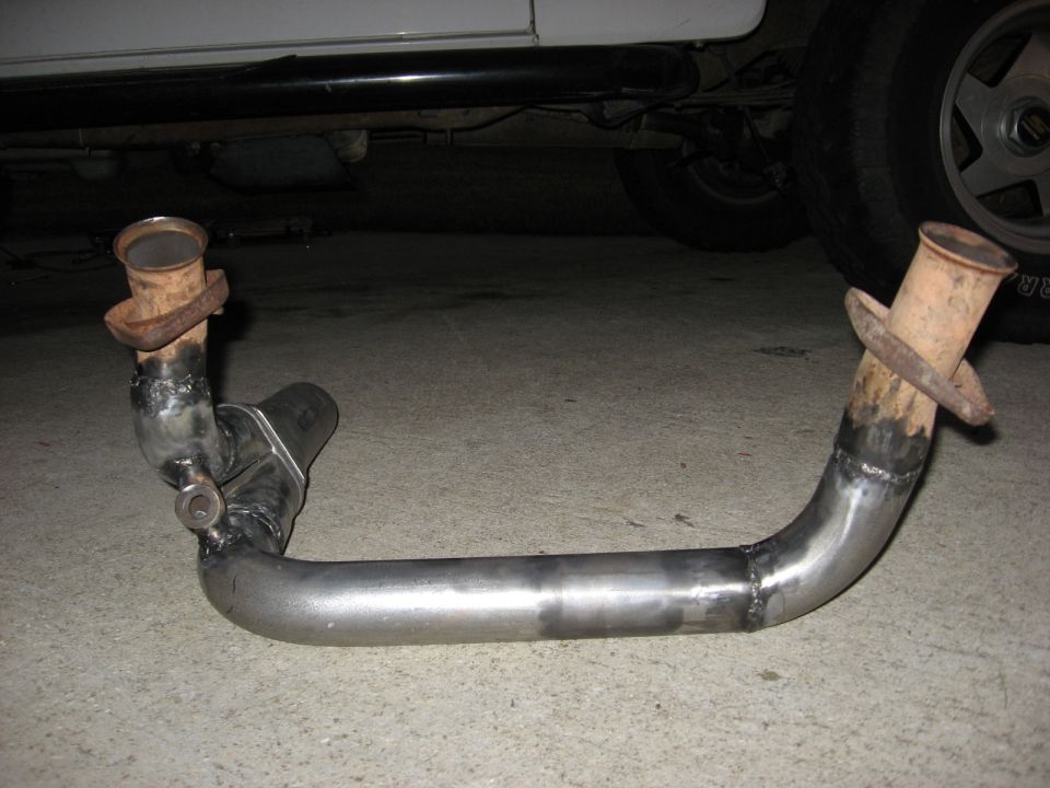Exhaust pipe section with rusty flanges