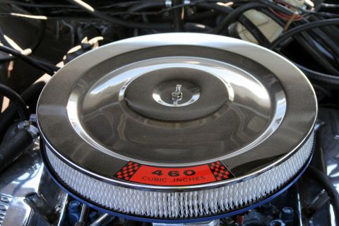 1976 Ford Ranchero - Close-up of a chrome air cleaner assembly with a label indicating 460 cubic inches.