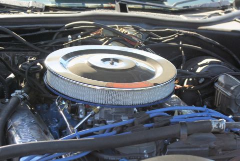 1976 Ford Ranchero - Engine bay detail a chrome air cleaner and spark plug wires.