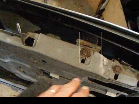 1979 Ford Ranchero - Detail of a car's door latch mechanism, showing internal components and mounting hardware.
