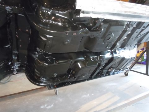 1973 Pontiac Trans Am - Undercarriage view of a vehicle, focusing on the fuel tanks and structural elements.