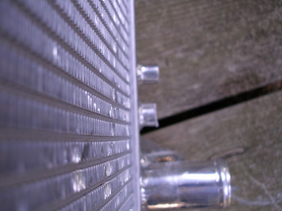 Radiator fins and hose connection