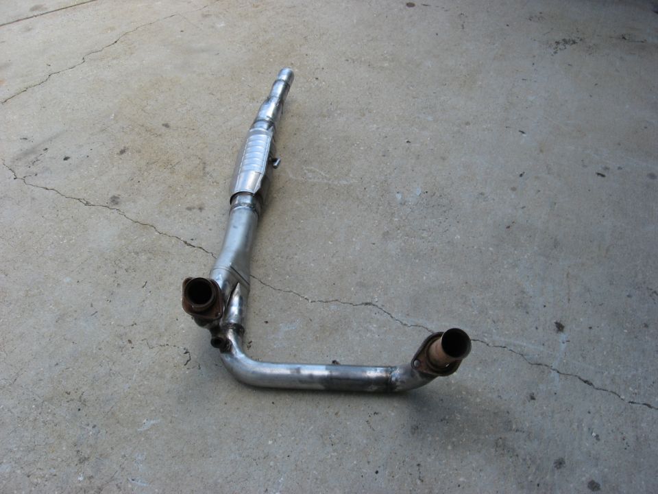 Exhaust pipe assembly with catalytic converter, showing two inlet pipes and one outlet pipe