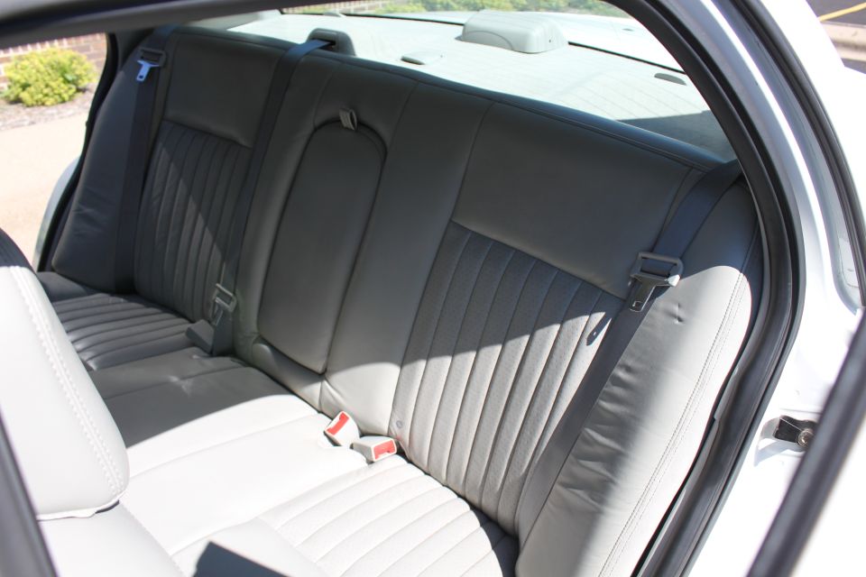 Gray rear seat interior with seatbelts