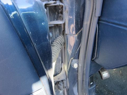 1991 Ford LTD Crown Victoria - The VIN plate is not visible, but there are some stamped numbers on the door jamb.