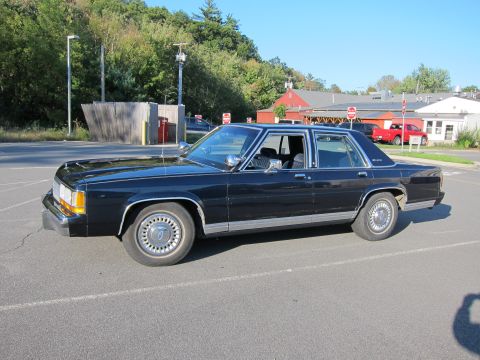 1991 Ford LTD Crown Victoria - This sedan's body style suggests it is from the early 1980s, not a 1991 model.