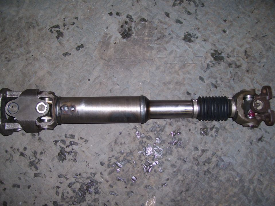 Custom driveshaft, started life as a front shaft for a F-350. 1350 U-joints with a custom 1350/1330 joint for the pinion flange.

For information on getting one of these sweet driveshafts talk to Jason at Thurlow Welding & Machine in Fargo, ND  (701) 282-2484