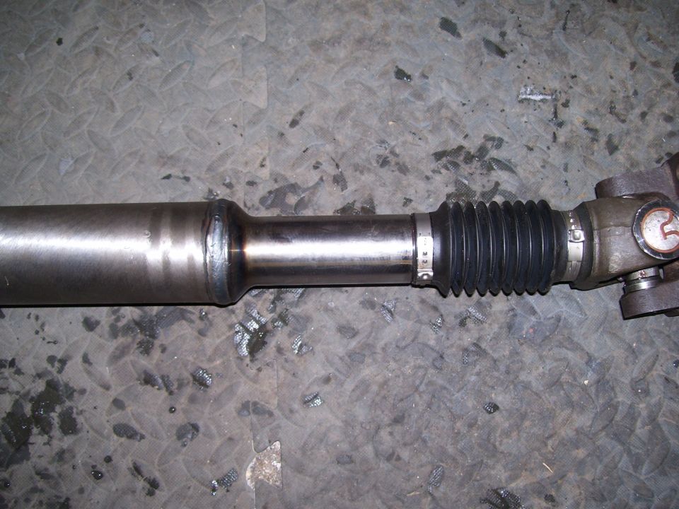 Custom driveshaft, started life as a front shaft for a F-350. 1350 U-joints with a custom 1350/1330 joint for the pinion flange.

For information on getting one of these sweet driveshafts talk to Jason at Thurlow Welding & Machine in Fargo, ND  (701) 282-2484