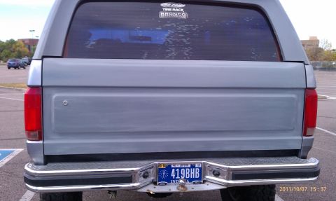 1994 Ford Bronco - Rear view of a 1994 Ford Bronco, showing the license plate and a Tire Rack Bronco sticker.
