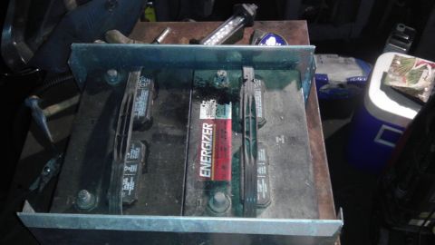 1989 Ford Bronco - Close-up of an Energizer car battery, showing its terminals and casing.