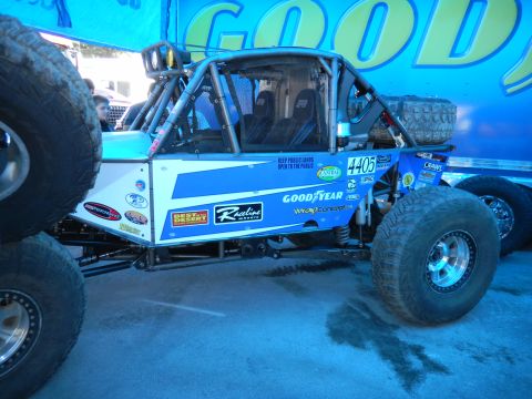 1997 Ford Ranger - This modified buggy is equipped for off-road racing with prominent sponsor decals.